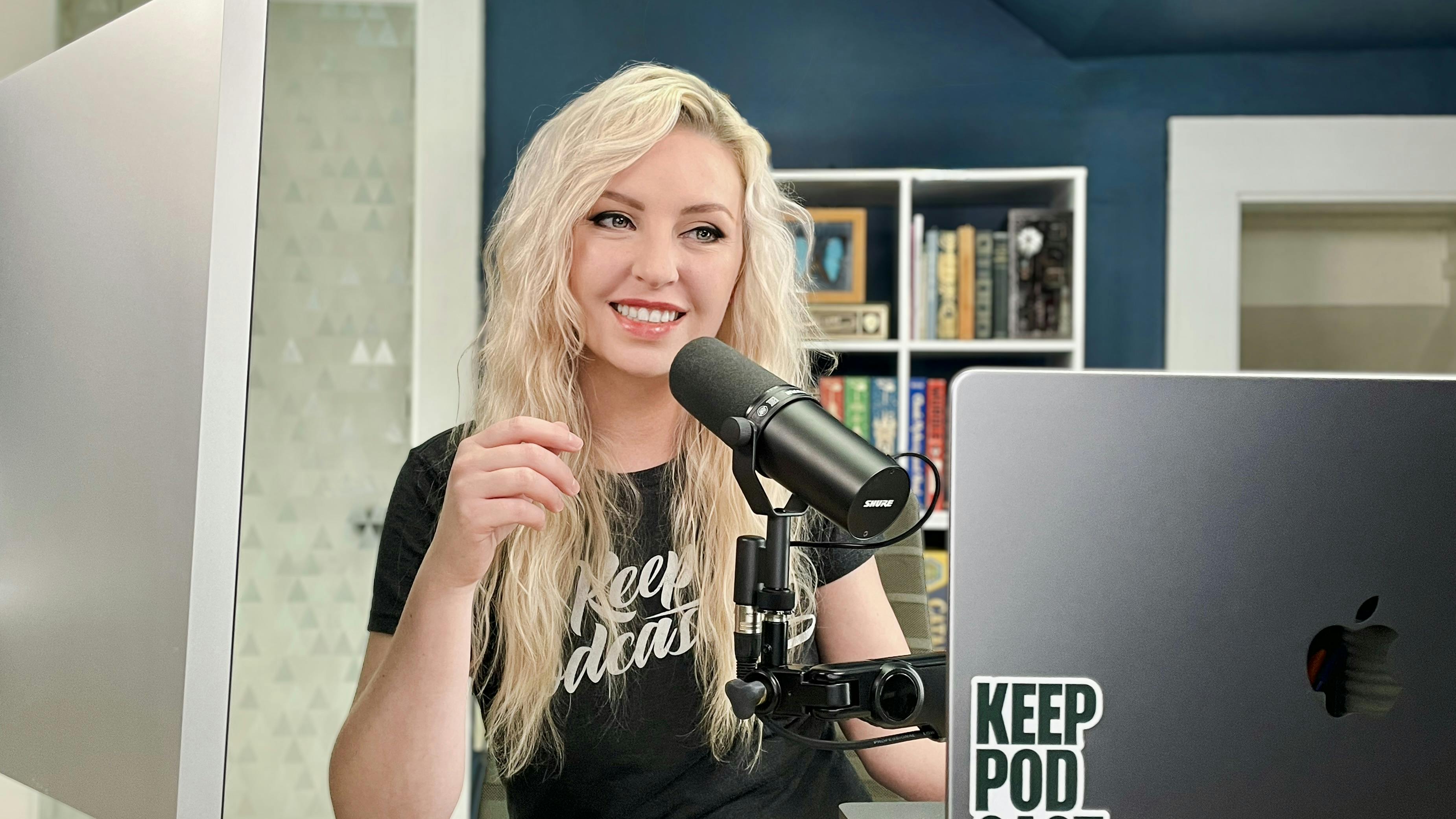 Jordan Blair podcasting at desk